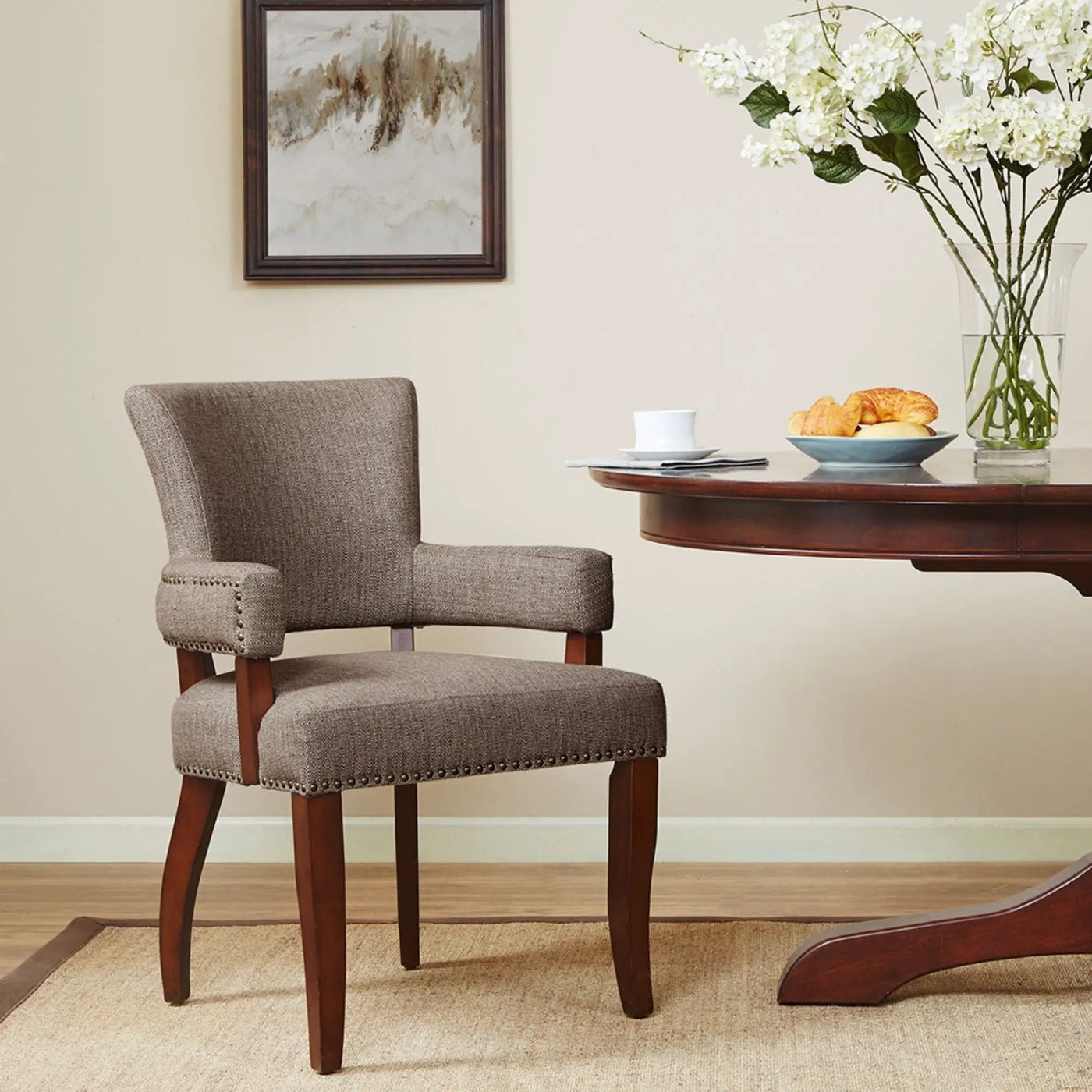 Elegant Arm Dining Chair With Brass Nail Head Detailing by HouseOfZazla