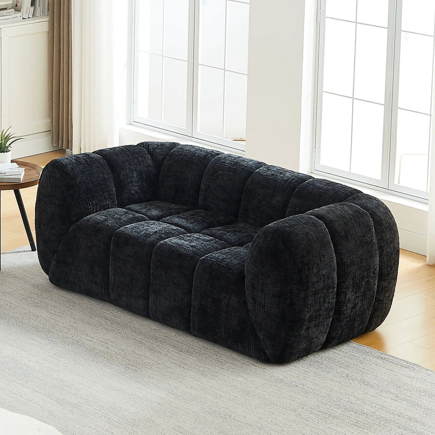 Quilted Cloud Sofa With Rounded Armrests And Piano Key Backrest Design by HouseOfZazla