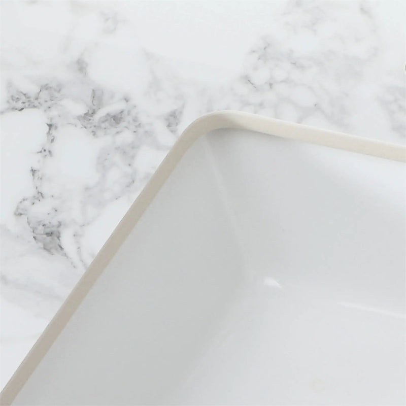 Elegant Sintered Stone Bathroom Vanity Top With Rectangular Undermount Ceramic Sink by HouseOfZazla