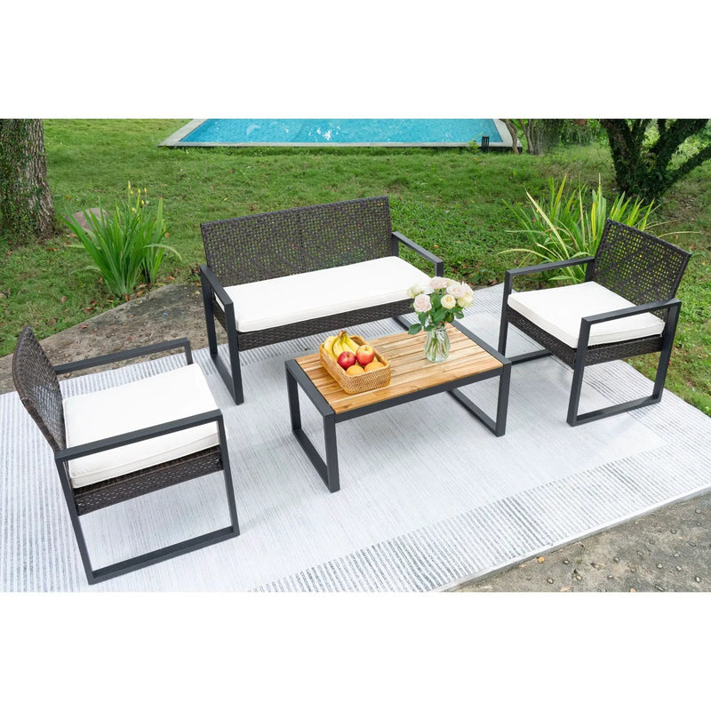 4 Piece Patio Furniture Set With Acacia Wood Table Top And Cushions by HouseOfZazla