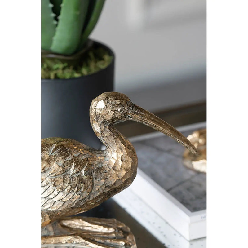 7.1x10.4x3" Kneeling Crane Figurine by HouseOfZazla
