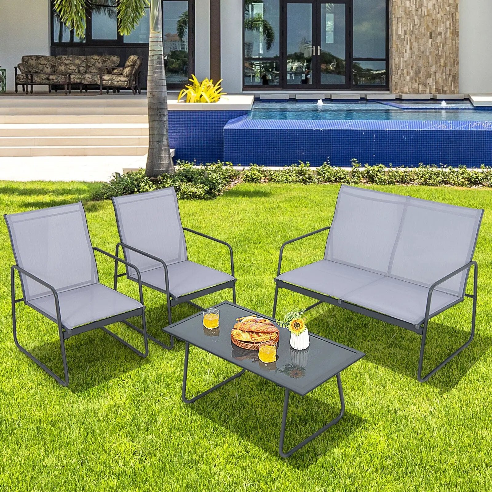 4 Pieces of Metal Patio Furniture Chat Set with Tempered Glass Coffee Table by DirectDeals