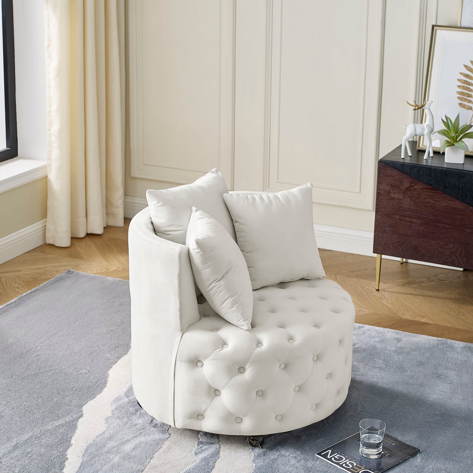 Modern Upholstered Swivel Chair With Button Tufted Design And Movable Wheels by HouseOfZazla