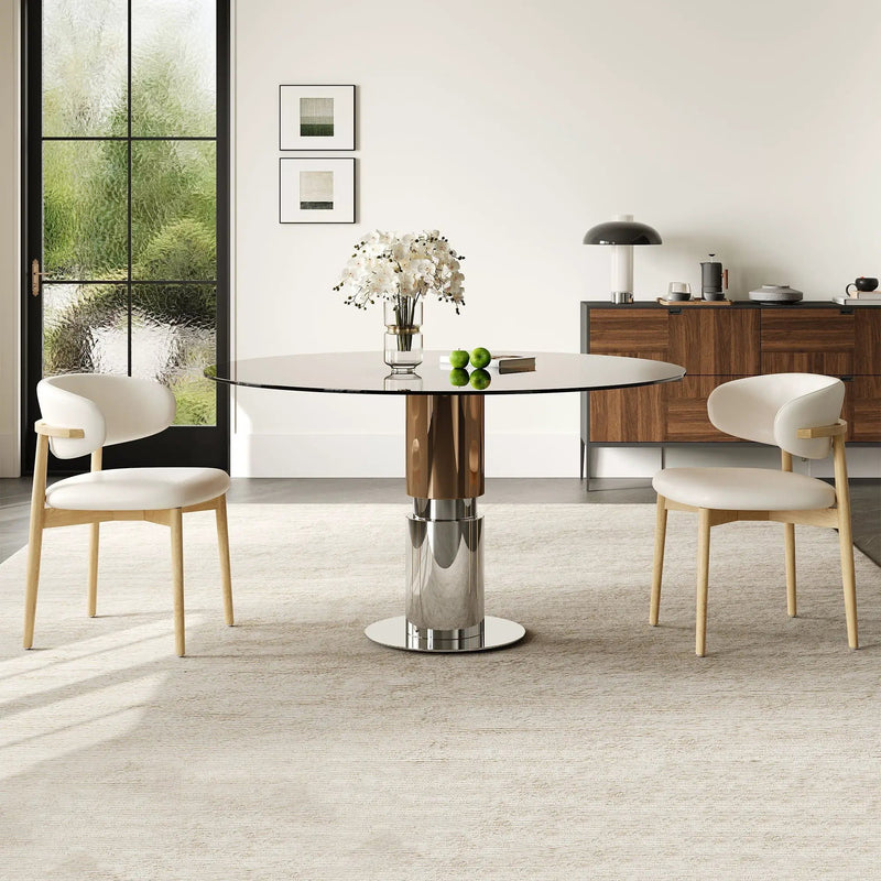 Round Glass Dining Table With Stainless Steel Legs And Chairs by HouseOfZazla