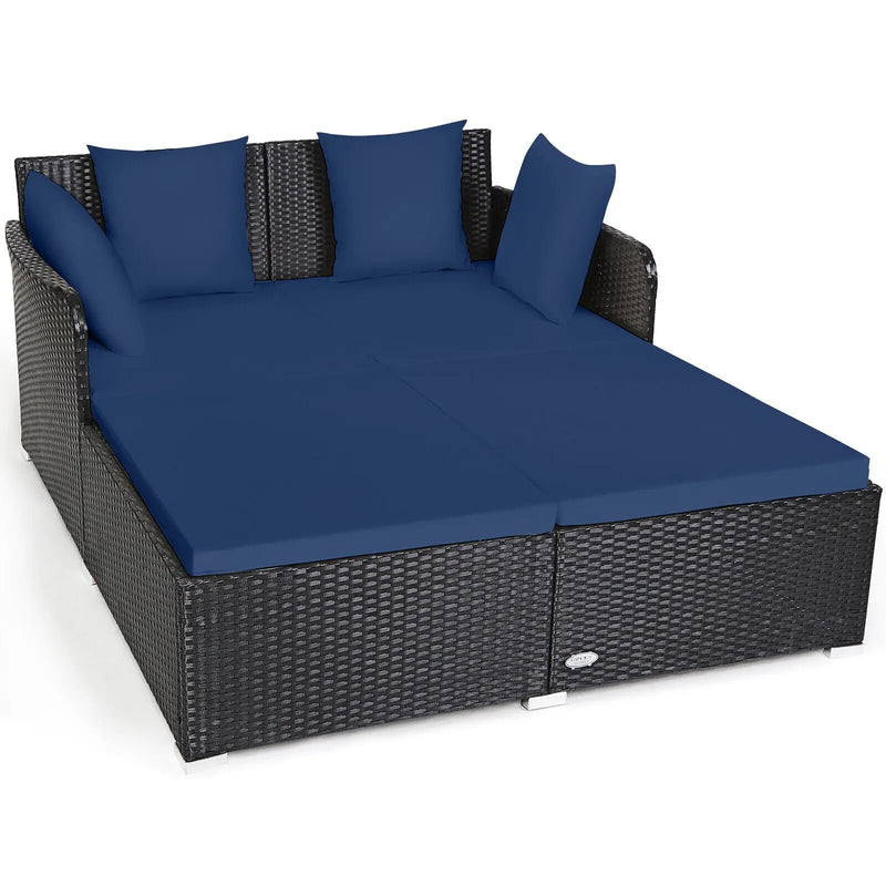 Spacious Outdoor Rattan Daybed with Upholstered Cushions and Pillows by DirectDeals