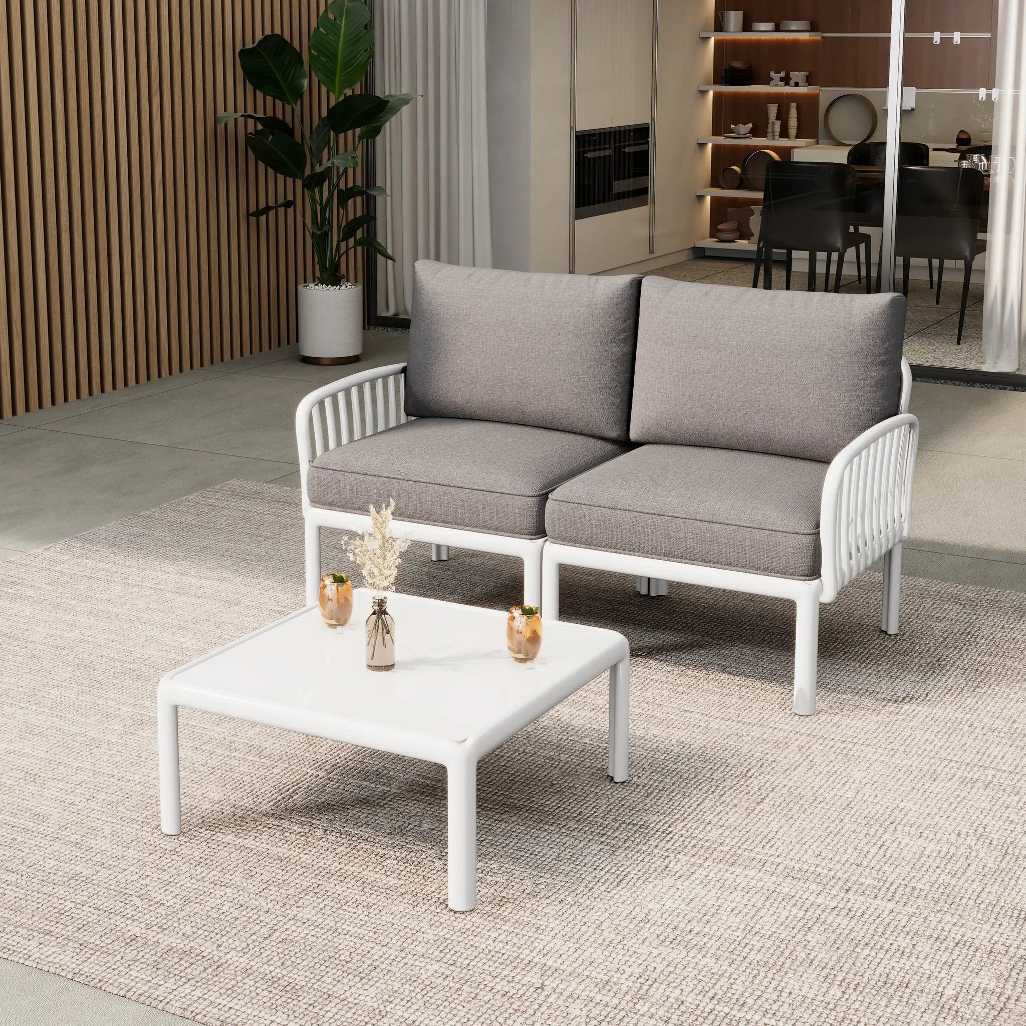 The Sleek All-Weather Resin Outdoor Loveseat and Coffee Table Set by HouseOfZazla