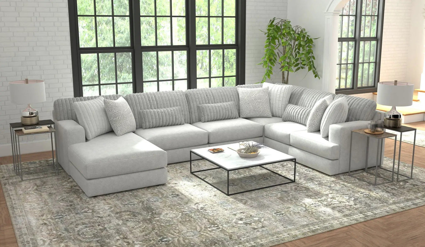 Logan - Upholstered Sectional With Comfort Coil Seating And Accent Pillows Included by Unique Piece Furniture