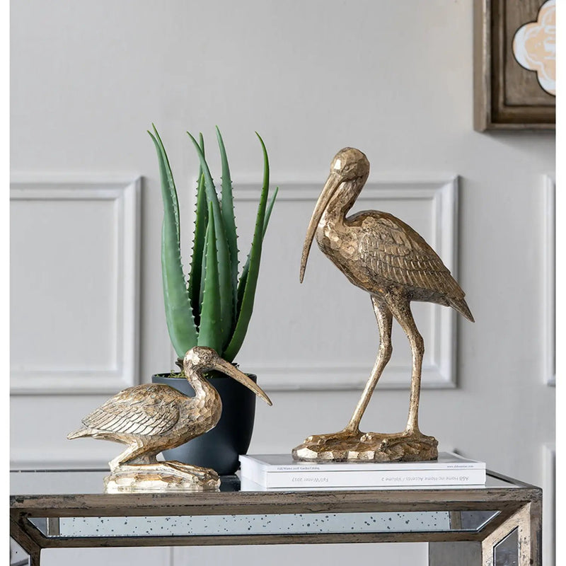 7.1x10.4x3" Kneeling Crane Figurine by HouseOfZazla