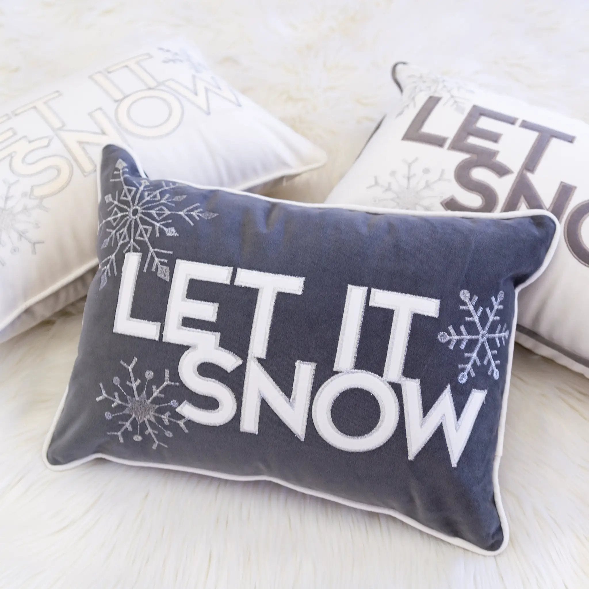Nneka Let It Snow Lumbar Pillow by HouseOfZazla