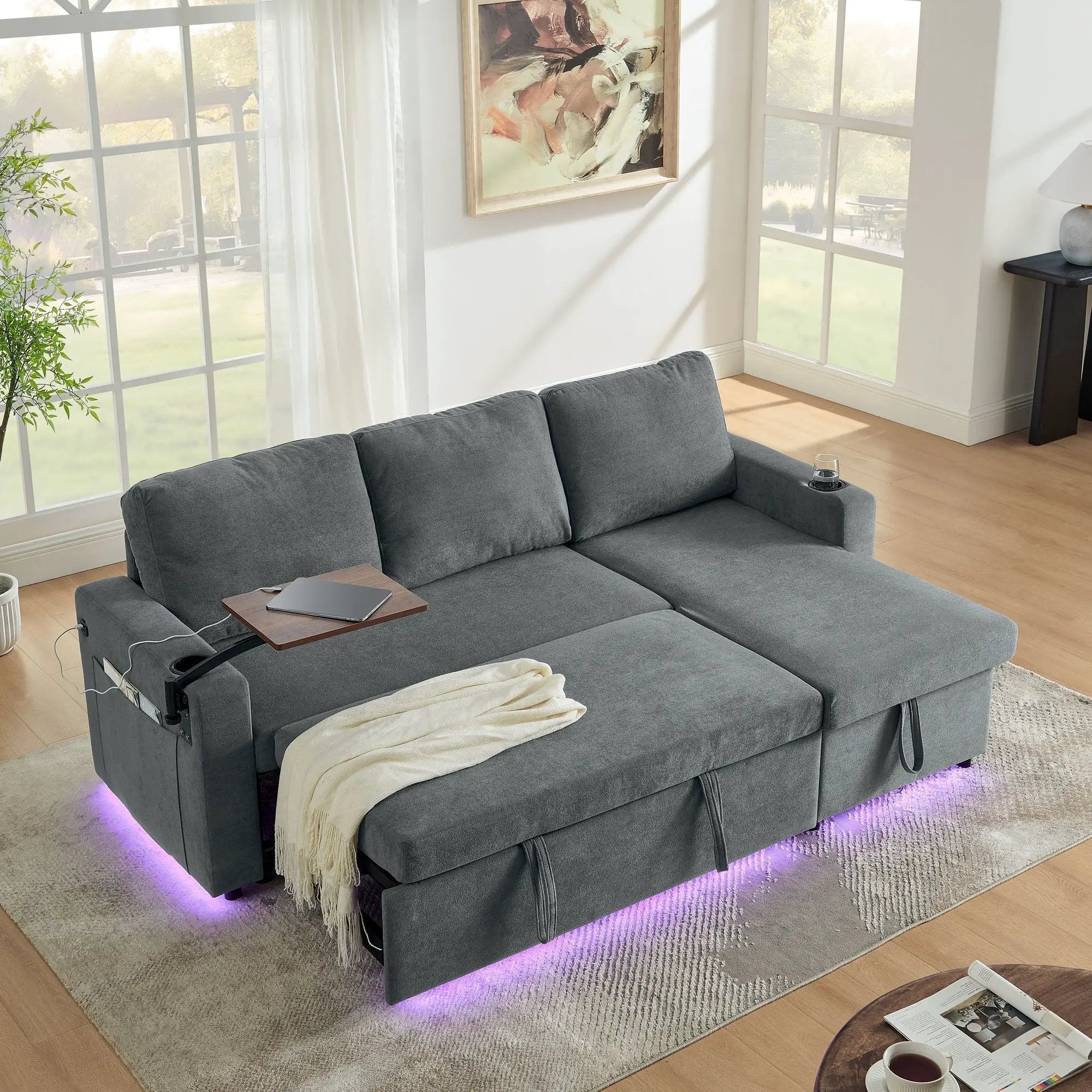 Multi Functional Pull Out Bed Sofa With Retractable Table, LED Lighting, USB Charging Ports & Cup Holders by HouseOfZazla