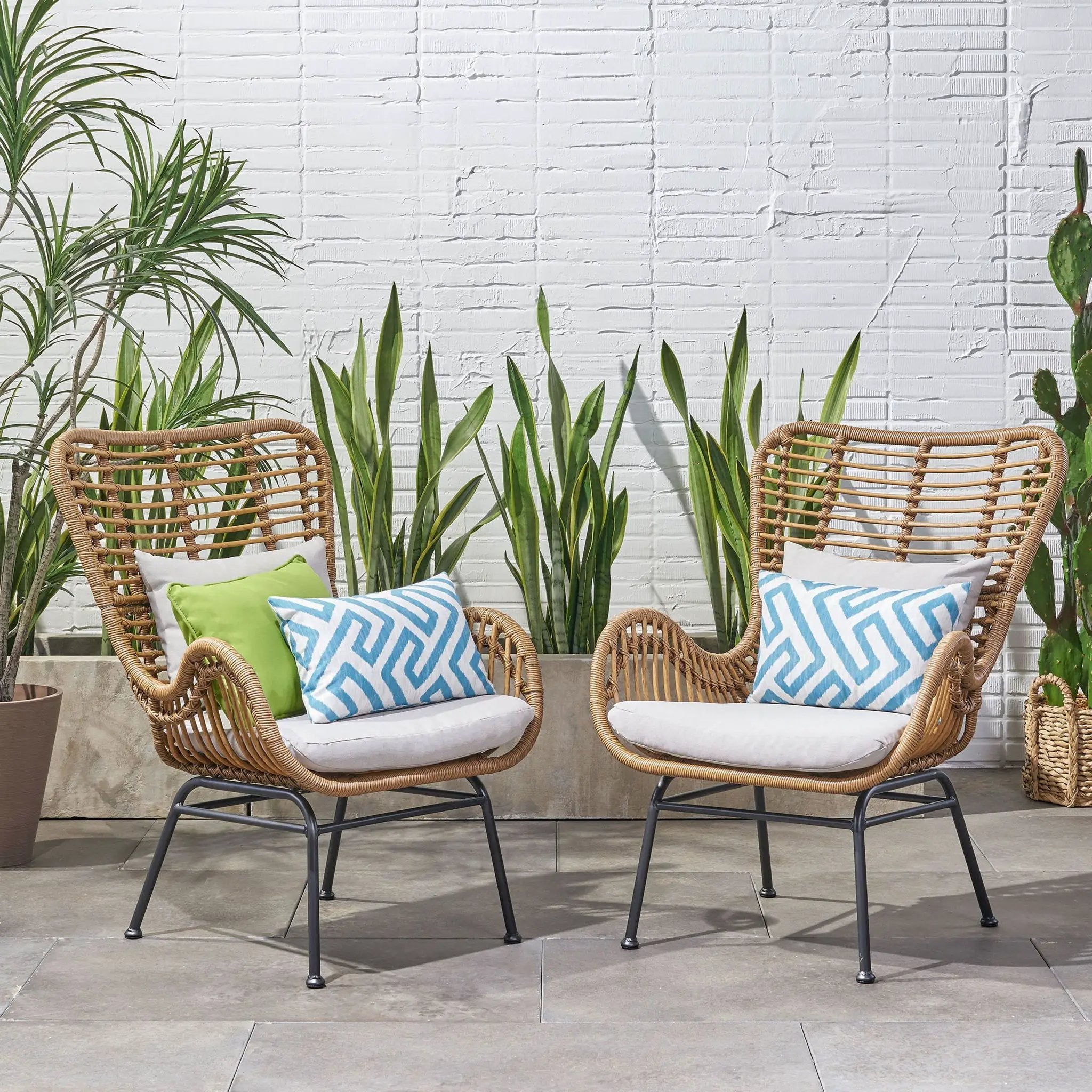 Modern Aesthetic Outdoor Rattan Accent Chair With Metal Legs by HouseOfZazla