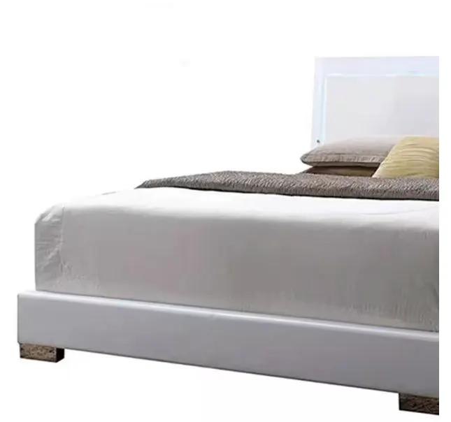 Lorimar White Faux Leather Panel Bed by HouseOfZazla