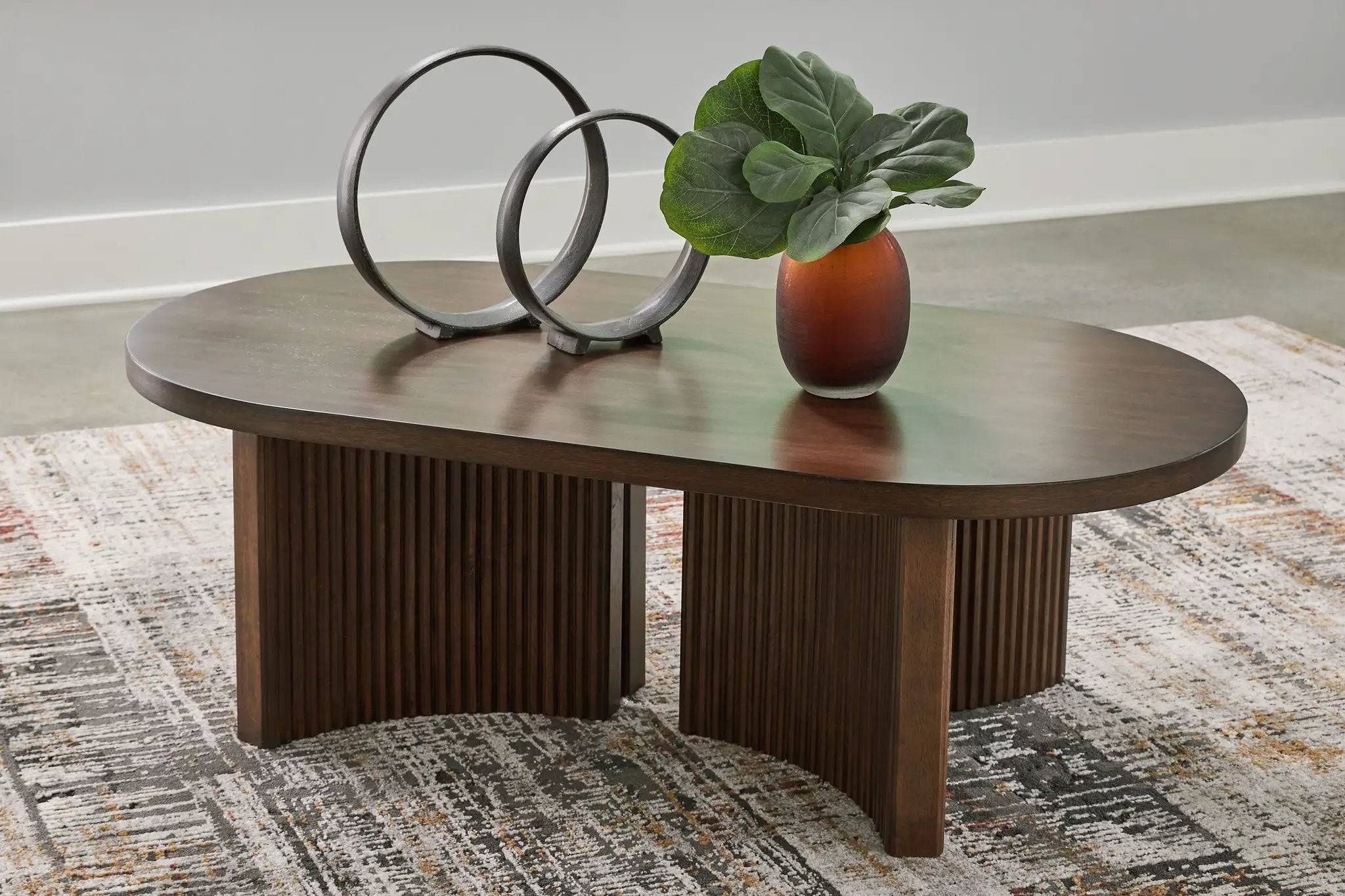 Korestone - Oval Cocktail Table - Dark Brown by Unique Piece Furniture