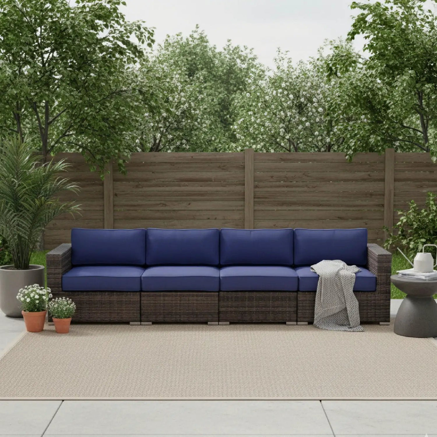 Luxurious Wicker Patio Sectional With Weather Resistant Sunbrella Cushions by HouseOfZazla