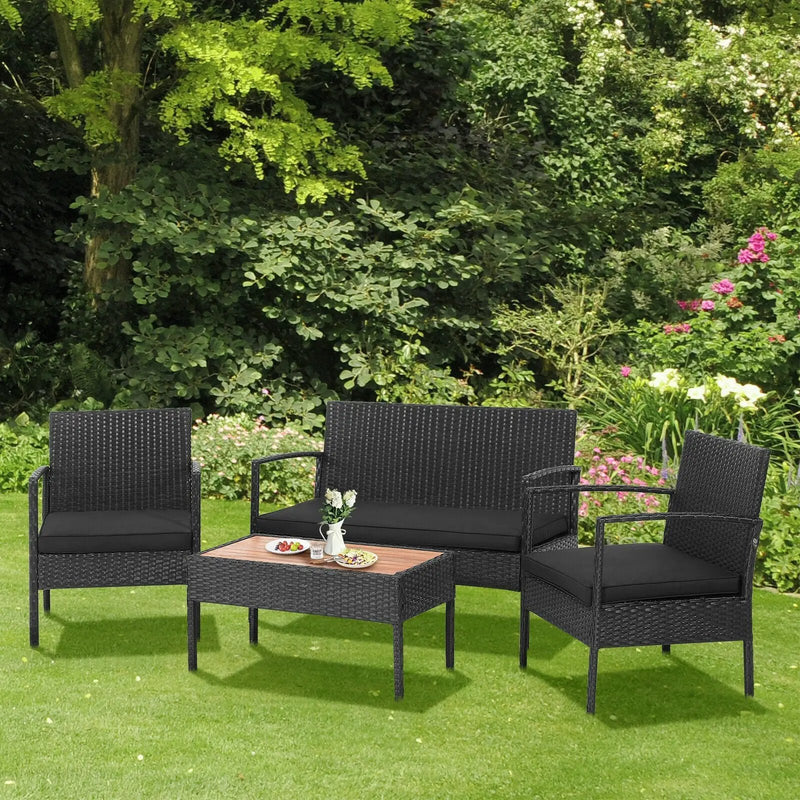4 Pieces Patio Rattan Cushioned Furniture Set with Wooden Tabletop by DirectDeals