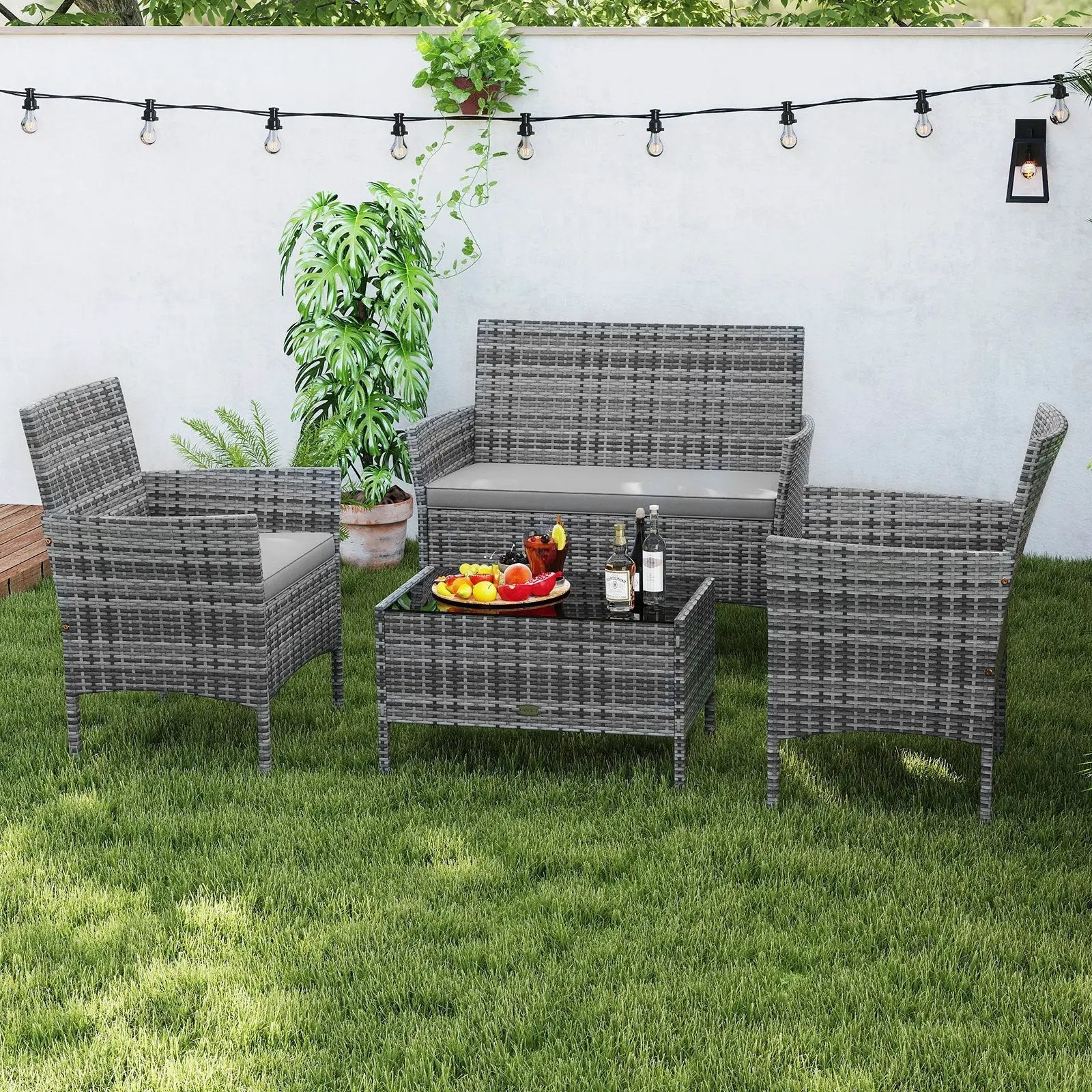 4 Pieces Patio Rattan Conversation Set with Tempered Glass Coffee Table by DirectDeals