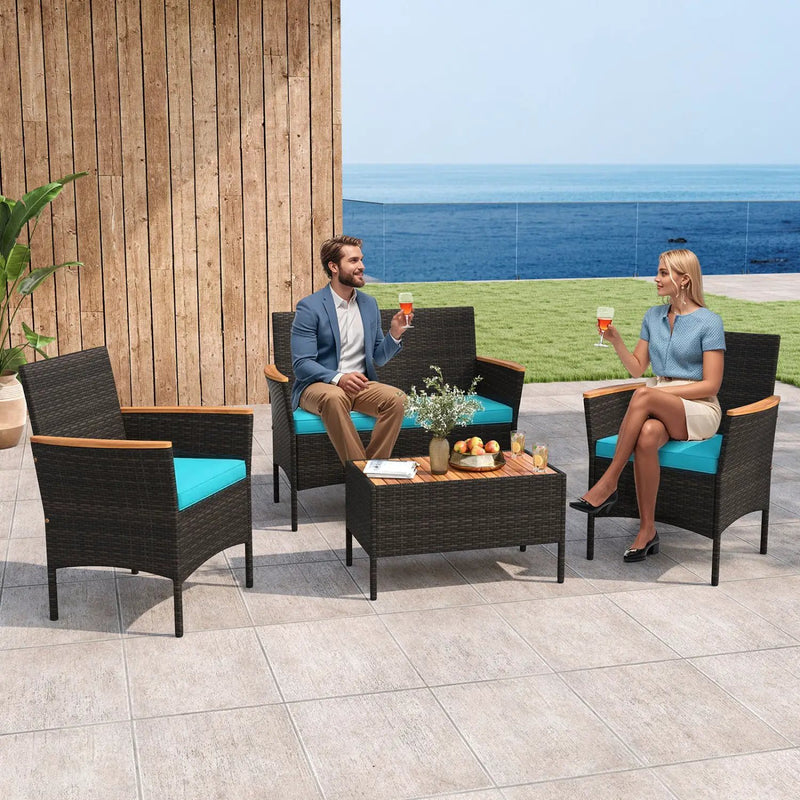 4-Piece Patio Conversation Set with Loveseat and Coffee Table by DirectDeals