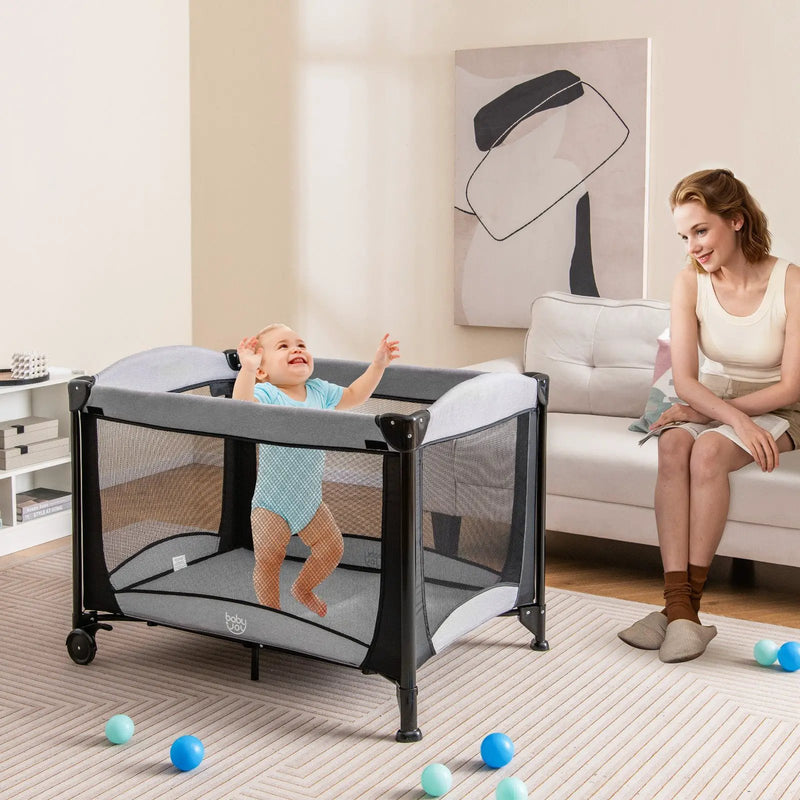 5-in-1 Portable Baby Playard with Cradle and Storage Basket by DirectDeals