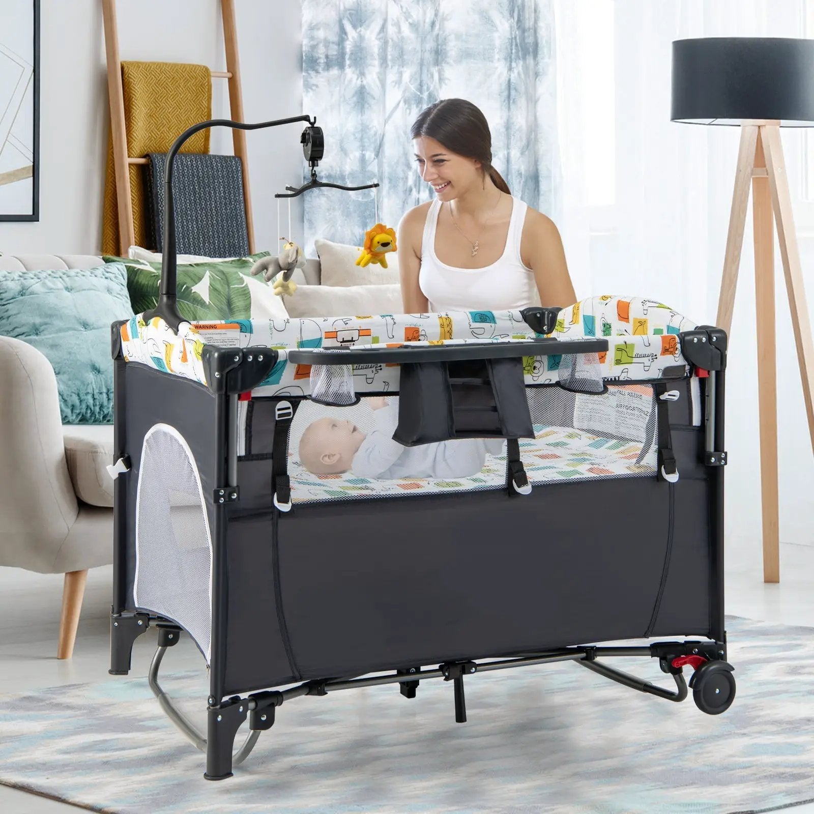 5-in-1 Baby Nursery Center Foldable Toddler Bedside Crib with Music Box by DirectDeals