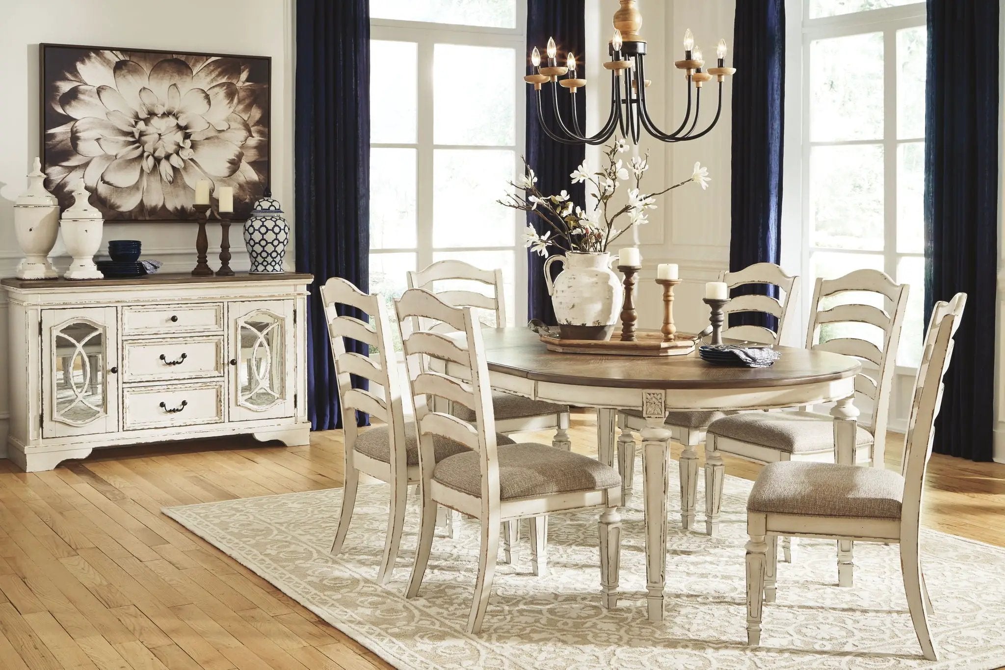 Realyn - Oval Dining Table Set by Unique Piece Furniture