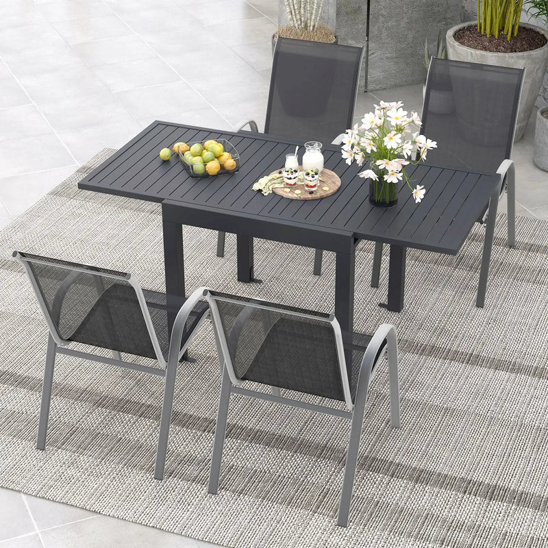 Outdoor Dining Table Set with Extendable Aluminum Table and 4 Stackable Chairs by DirectDeals