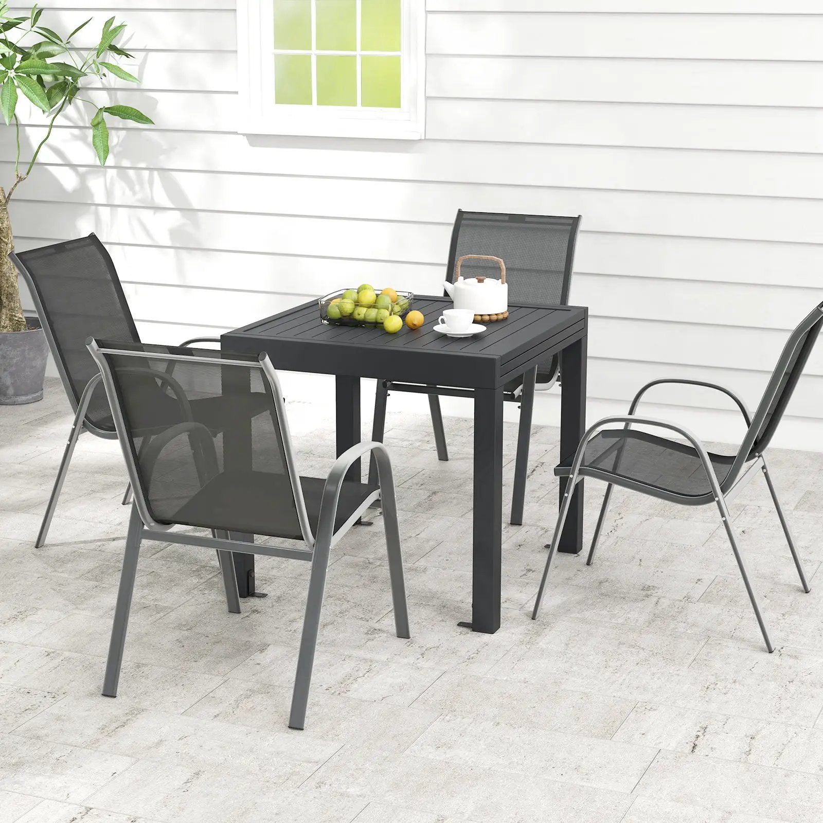 Outdoor Dining Table Set with Extendable Aluminum Table and 4 Stackable Chairs by DirectDeals