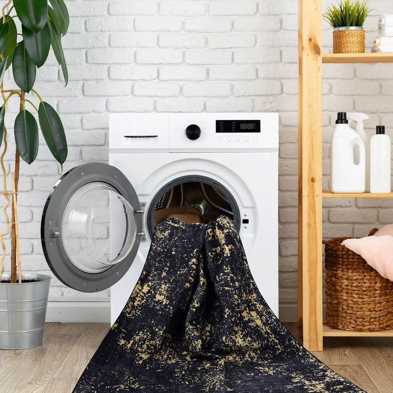Maval - 8' X 10' Washable Area Rug - Black / Gold by Unique Piece Furniture