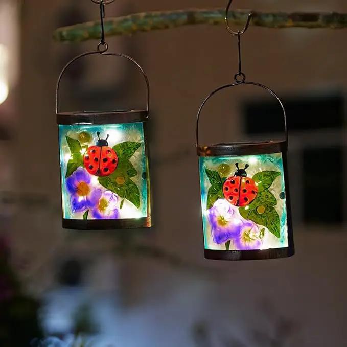 Starsoul 2 Pack Hanging Solar Lantern Outdoor Waterproof Glass Ladybug and Flowers Decorative Solar Lights for Outside Garden Yard Table Patio Decor by GreenHaven Gardens