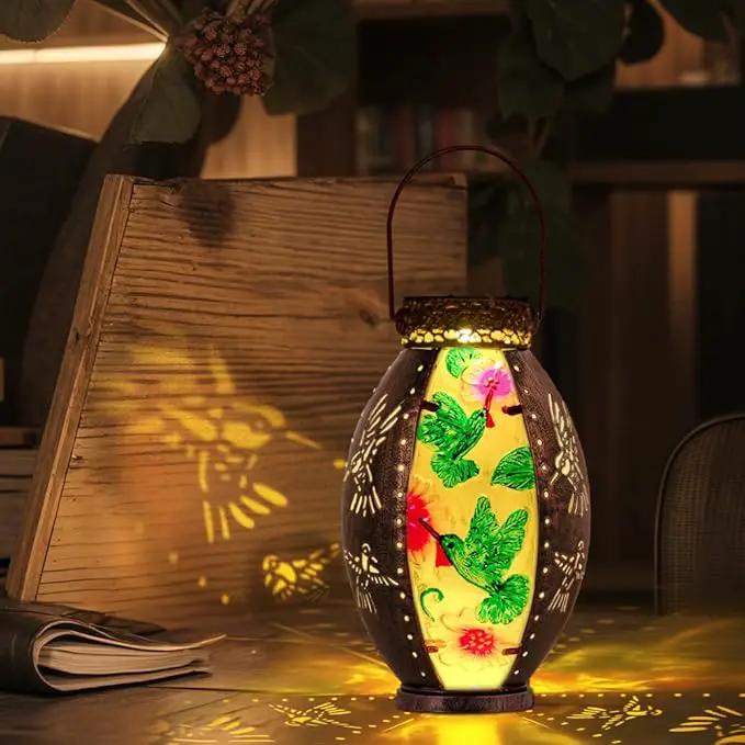 Starsoul Flamingo + Hummingbird Solar Lantern Solar Hot Air Balloon Flickering Flame Hanging Garden Light Stained Glass & Metal Outdoor Lantern Waterproof Hummingbird Hanging Lantern by GreenHaven Gardens