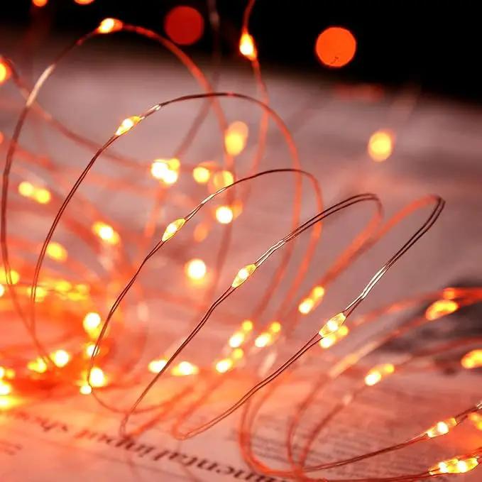 QITONG 4 Pack Orange Solar Fairy Lights, Each 33ft 100 LED Solar Christmas Lights Outdoor Waterproof, 8 Modes Christmas String Lights by GreenHaven Gardens