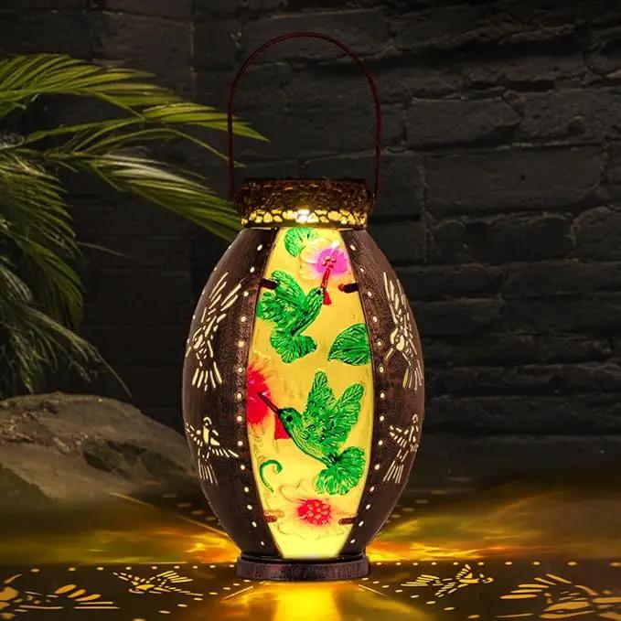 Starsoul Flamingo + Hummingbird Solar Lantern Solar Hot Air Balloon Flickering Flame Hanging Garden Light Stained Glass & Metal Outdoor Lantern Waterproof Hummingbird Hanging Lantern by GreenHaven Gardens