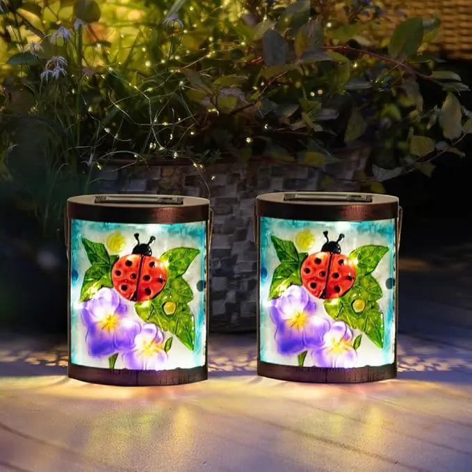 Starsoul 2 Pack Hanging Solar Lantern Outdoor Waterproof Glass Ladybug and Flowers Decorative Solar Lights for Outside Garden Yard Table Patio Decor by GreenHaven Gardens