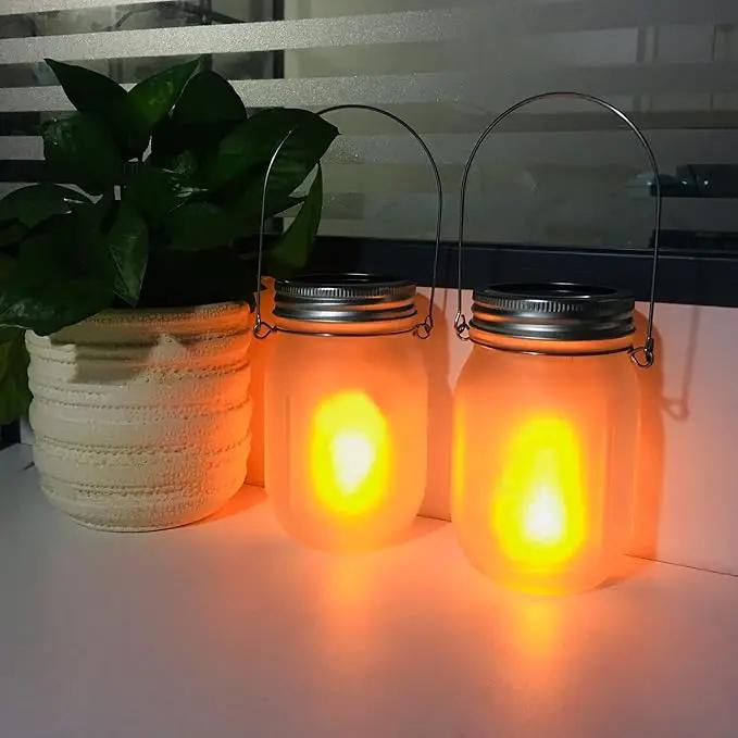 Solar Mason Jar Flicker Lights Upgraded, 4 Pack Flickering Torches Lights Outdoor Hanging Lanterns Landscape Decoration Lighting Dusk to Dawn Auto On/Off Security Halloween Torch Lights by GreenHaven Gardens