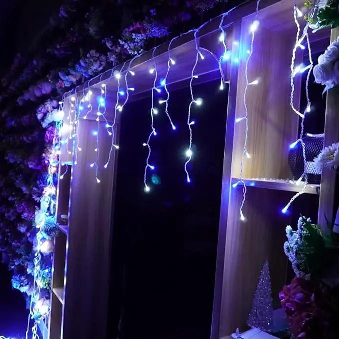 YASENN 300Led Icicle Style String Lights 29.5FT,Update Connectable 8 Lighting Modes with Timer Icicle Lights for Home Garden Outdoor Indoor Eave Decor (Blue and White LED White Cable) by GreenHaven Gardens