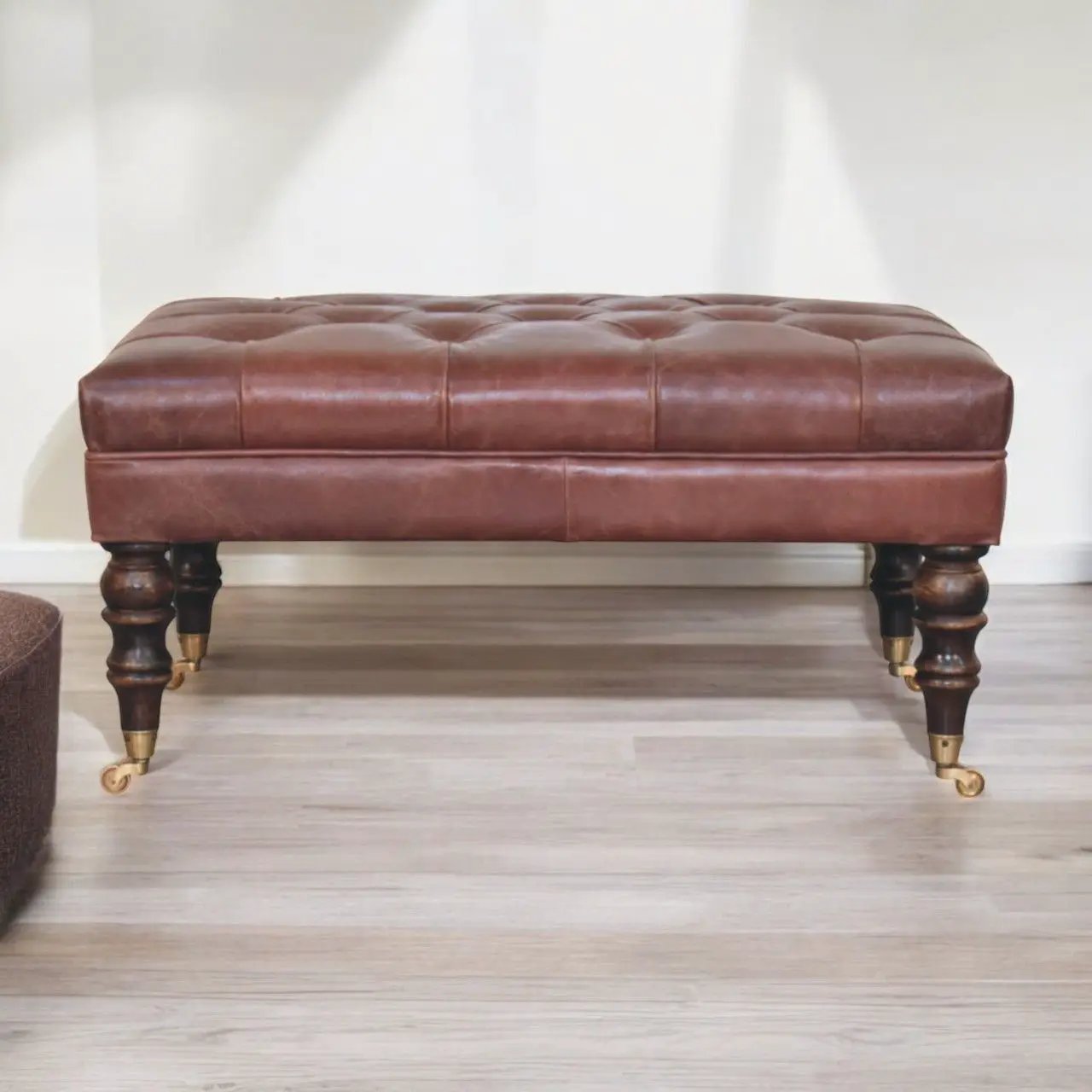 Buffalo - Ottoman With Castor Legs by HouseOfZazla