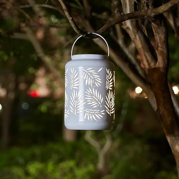 Glitzhome Solar Lantern White Metal Cutout Leaf Outdoor Hanging Solar Light with Handle for Garden Patio Yard Outdoor Decor by GreenHaven Gardens