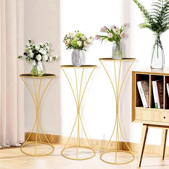 chamvis Gold Metal Plant Stand, 3 Pcs Tall Cylinder Pedestal Stands for Parties and Weddings, Gold Round Cylinder Tables for Living Room and Patio Decor (Hourglass) by GreenHaven Gardens