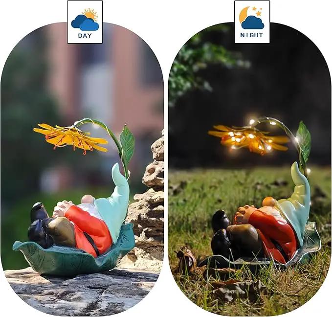 Solar Powered Gnome Garden Statue - Resin Gnome on Green Leaf with Large Yellow Stamen Sunshade, LED Lights Decorations, for Women Men, Outdoor Decor Ornaments for Outside by GreenHaven Gardens