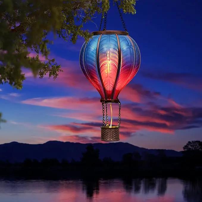 TERESA'S COLLECTIONS Hot Air Balloon Solar Lantern for Garden Decor Halloween Christmas Party,Flickering Flame Hanging Solar Light for Outdoor ,Blue & Purple Plastic Lamp for Yard Tree,Gift for Mom by GreenHaven Gardens