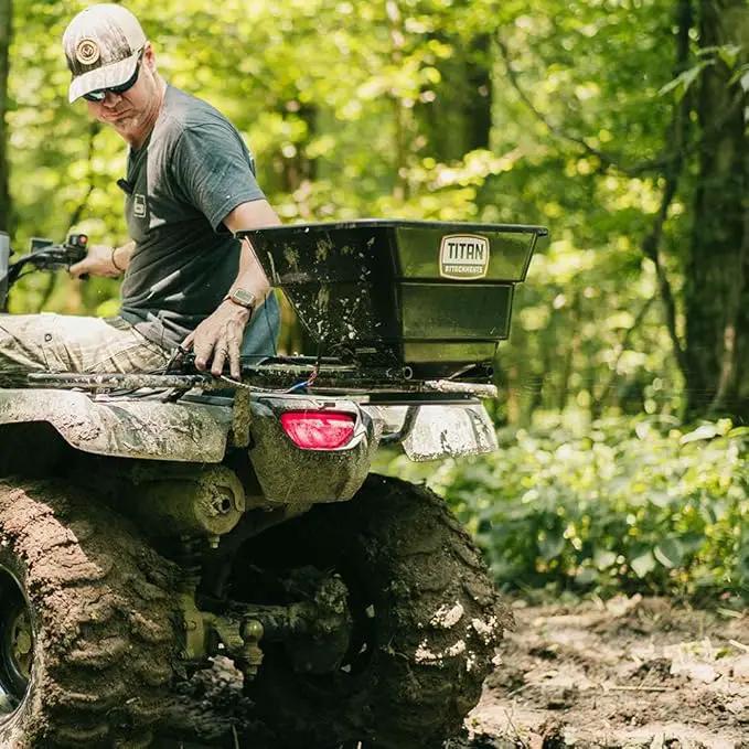 Titan Attachments 12 Volt ATV/UTV Broadcast Spreader, 80 LB Capacity, Back or Front Mounting for ATV, UTV, Or Utility Tractor, Lawn and Garden Seed Spreader with Rain Cover by GreenHaven Gardens