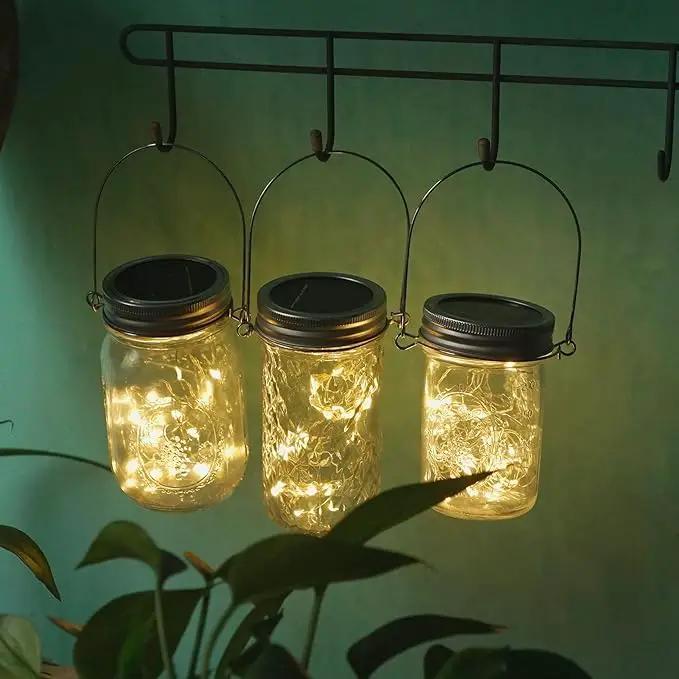 Decorman Solar Mason Jar Lights, 4 Pack 30 LED Fairy Star Firefly String Lids Lights with 4 Hangers for Patio Yard Garden Party Wedding Christmas Decoration(Jars Not Included) (4 Pack, Warm White) by GreenHaven Gardens