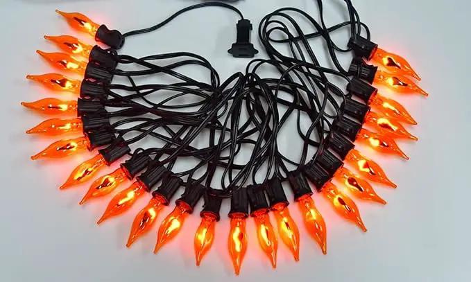 27.8Ft Halloween Decorations Flickering Flame String Lights with 27 Pack Orange Clear Flame Light Bulbs (4 Spare E12 Bulbs), Orange Christmas Lights Outdoor for Home Party Christmas Halloween Decor by GreenHaven Gardens