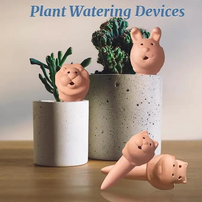 Plant Watering Devices 4 Pack Terracotta Vacation Plant Waterer Bottle Watering Stakes Slow Release Plant Watering Spikes Self Watering Devices for Indoor Outdoor Plants by GreenHaven Gardens