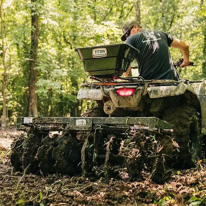 Titan Attachments 12 Volt ATV/UTV Broadcast Spreader, 80 LB Capacity, Back or Front Mounting for ATV, UTV, Or Utility Tractor, Lawn and Garden Seed Spreader with Rain Cover by GreenHaven Gardens