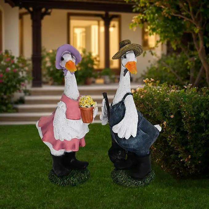 Porch Goose Statue with Outfits Large Garden Sculpture Home Outdoor Decorations Lawn Resin Big Duck Figurine Outside Yard Geese Decor Life Size Farmhouse Duckling Couple Dress Up by GreenHaven Gardens