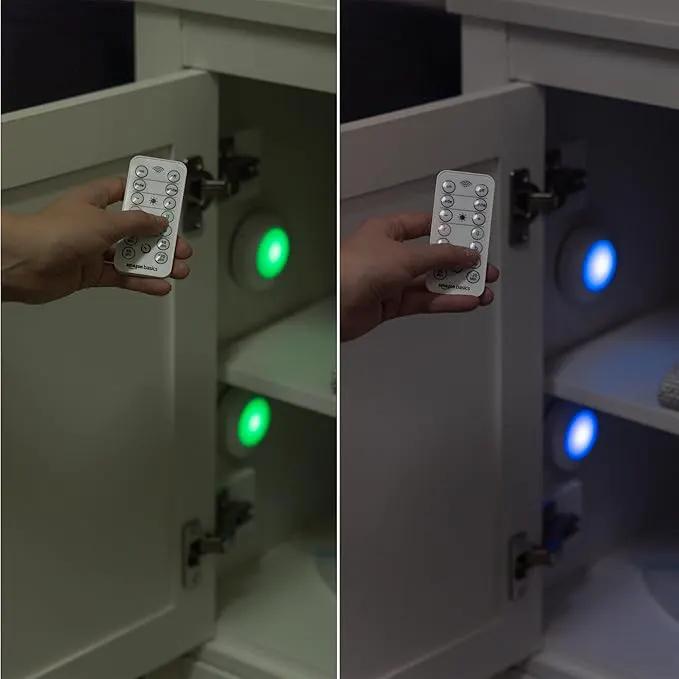 Amazon Basics LED Puck Lights, Color Changing, Battery Operated, IR Remote, 40 Lumens, 2 Pack, Wireless Stick on Lights, Under Cabinet Lighting, Ideal for Closets, and More, White by GreenHaven Gardens