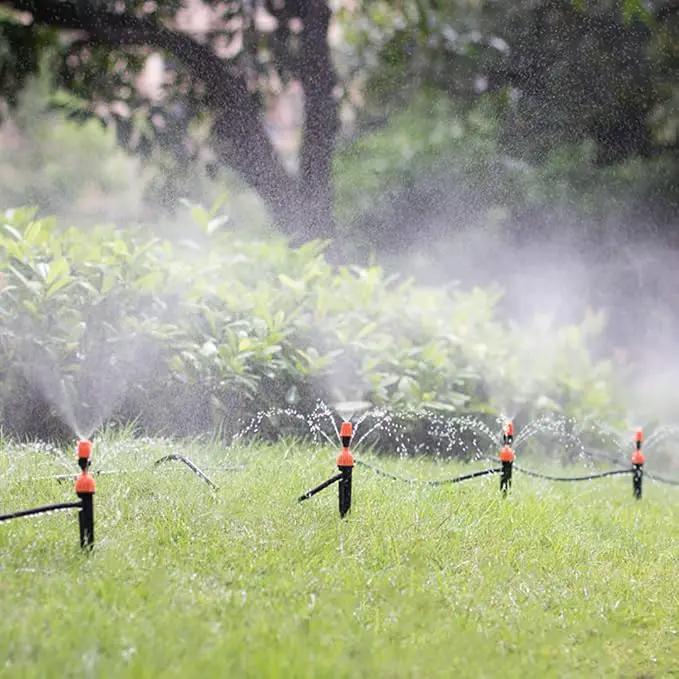 Kalolary 1/4 Inch Drip Irrigation Emitters, 20PCS Micro Spray Irrigation Drippers for 4/7mm Tube Adjustable Water Flow Sprinklers Garden Irrigation Sprayer for Potted Plants Watering System (Orange) by GreenHaven Gardens