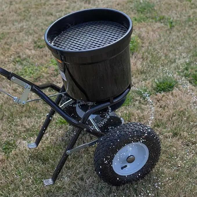 Titan Attachments 50 lb Professional Fertilizer Push Broadcast Spreader, Spreads 10 to 12 FT, Lawn Care and Ice Melter, Yard Tool by GreenHaven Gardens