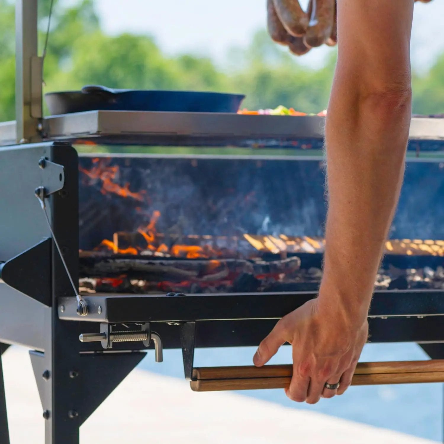 Backyard Discovery Argentine Santa Maria Heritage Wood Fire & Charcoal BBQ Grill with Adjustable Grill Grates, Fire Bricks, Heavy-Duty Steel, S-Hooks, Acacia Wood Table for Outdoor Gaucho Grilling by GreenHaven Gardens