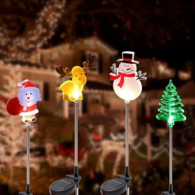 Glintoper 4 Pack Solar Christmas Figurine Lights, Outdoor Lighted Decorative Santa Claus, Snowman, Xmas Tree & Reindeer with Garden Stakes, Warm White LED Lighting Yard Stake for Path Lawn Patio Decor by GreenHaven Gardens